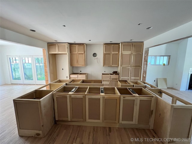 4949 S Boston Pl, Tulsa, OK 74105 - kitchen with wood finished floors, recessed lighting, and a kitchen island