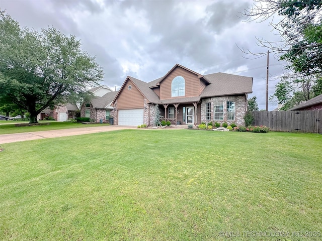 7515 S 108th E Ave, Tulsa, OK 74133 - view of front facade featuring concrete driveway, a garage, a shingled roof, and stone siding