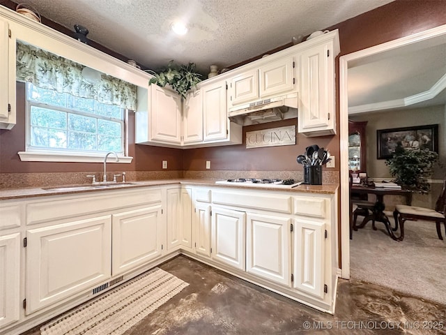 7515 S 108th E Ave, Tulsa, OK 74133 - kitchen with under cabinet range hood, white gas stovetop, white cabinetry, a textured ceiling, and an office area