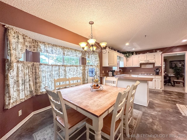 7515 S 108th E Ave, Tulsa, OK 74133 - dining area featuring a chandelier, a textured ceiling, recessed lighting, and concrete floors