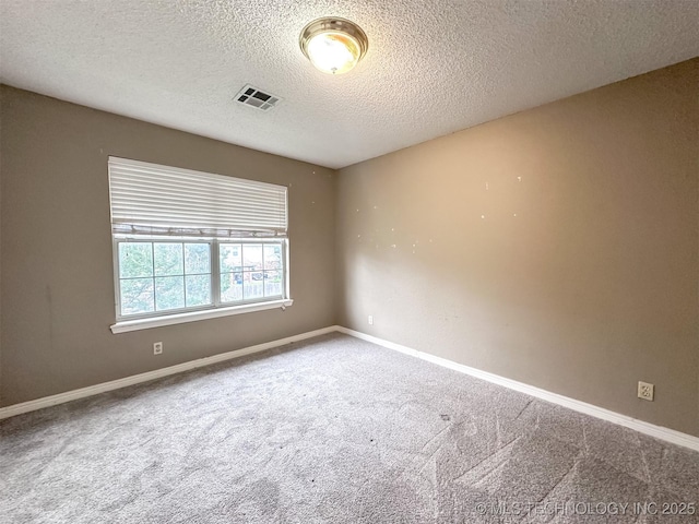 7515 S 108th E Ave, Tulsa, OK 74133 - carpeted empty room with a textured ceiling and baseboards