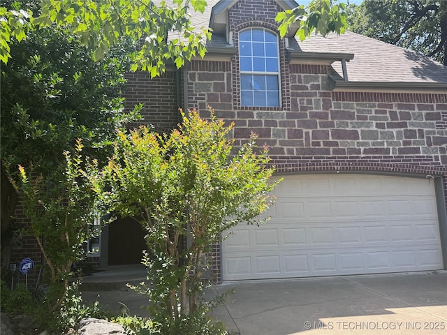 9533 S 88th E Ave, Tulsa, OK 74133 - exterior view of driveway and roof with shingles
