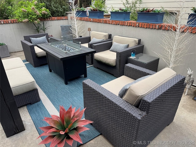 2920 E 27th Pl, Tulsa, OK 74114 - view of patio / terrace featuring an outdoor living space with a fire pit