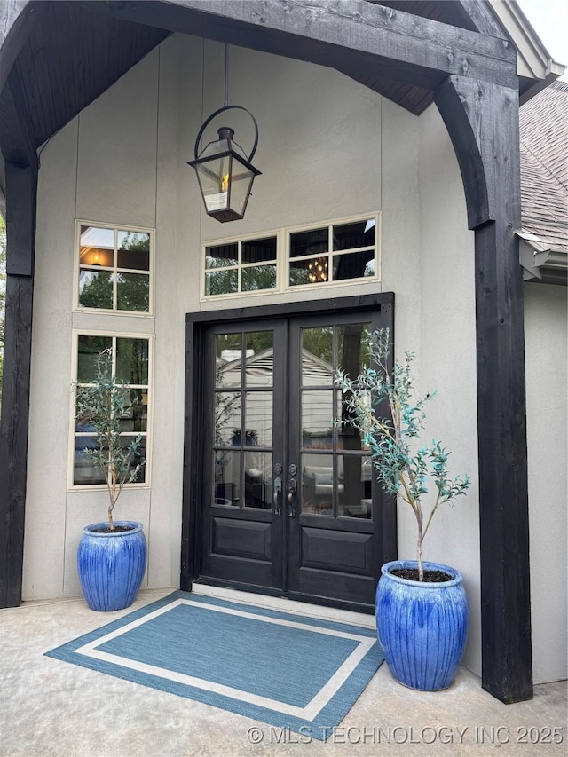 2920 E 27th Pl, Tulsa, OK 74114 - entrance to property with french doors and stucco siding