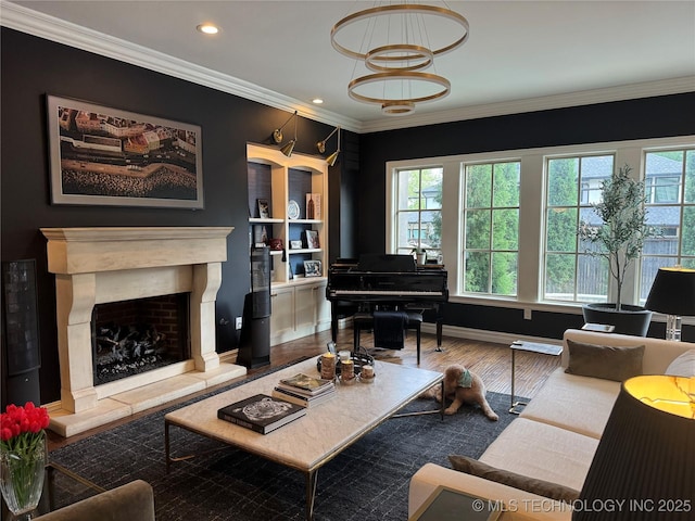 2920 E 27th Pl, Tulsa, OK 74114 - living area featuring crown molding, recessed lighting, a high end fireplace, wood finished floors, and built in features