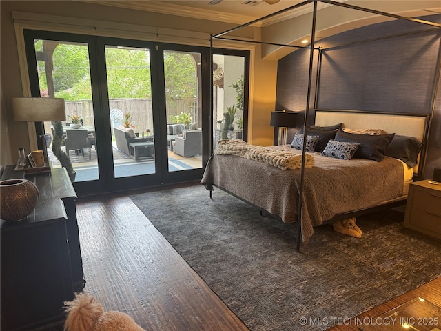2920 E 27th Pl, Tulsa, OK 74114 - bedroom featuring ornamental molding, wood finished floors, and access to outside