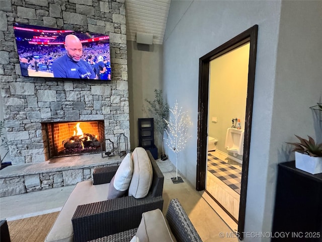 2920 E 27th Pl, Tulsa, OK 74114 - living area featuring a fireplace and lofted ceiling