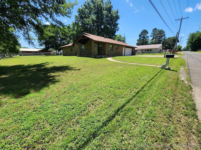 72078 S 321st Rd, Wagoner, OK 74467 - view of yard with a garage and driveway