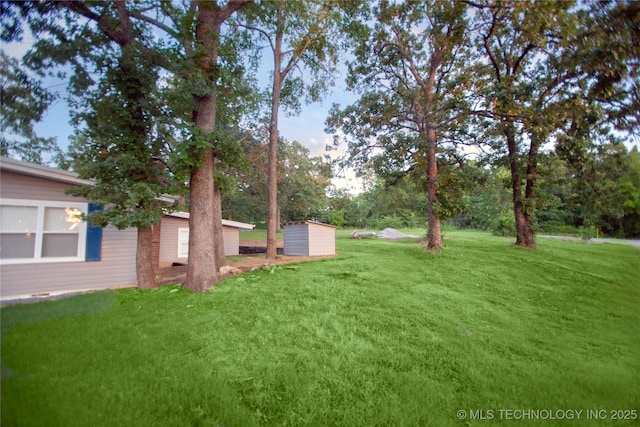 416434 Lakeside, Checotah, OK 74426 - view of grassy yard featuring a storage shed