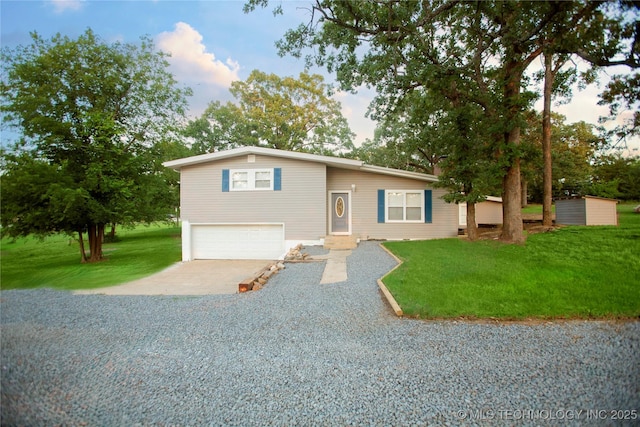 416434 Lakeside, Checotah, OK 74426 - split level home with concrete driveway, a garage, and a front yard