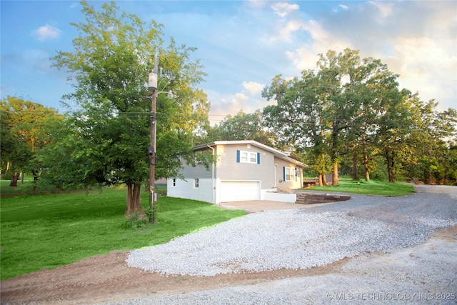 416434 Lakeside, Checotah, OK 74426 - view of front of property featuring an attached garage, driveway, and a front lawn