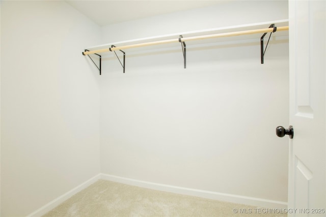 416434 Lakeside, Checotah, OK 74426 - spacious closet featuring light colored carpet