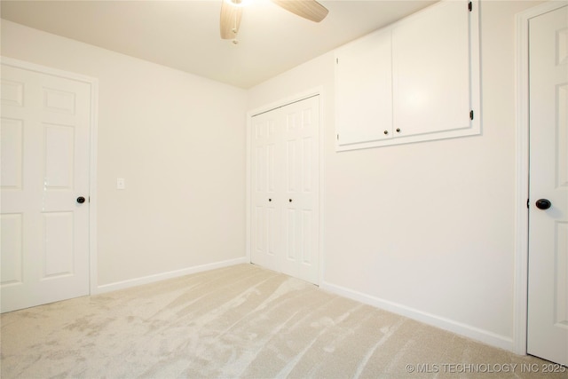 416434 Lakeside, Checotah, OK 74426 - unfurnished bedroom with light colored carpet, a closet, and a ceiling fan