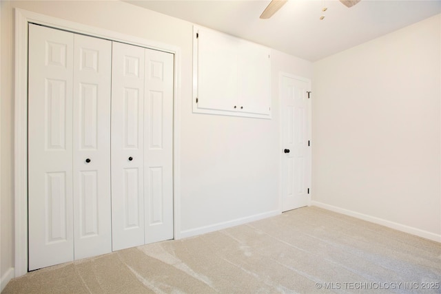 416434 Lakeside, Checotah, OK 74426 - unfurnished bedroom with light colored carpet, a closet, and ceiling fan