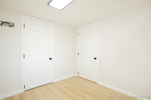 416434 Lakeside, Checotah, OK 74426 - empty room featuring light wood-style flooring and baseboards