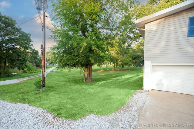 416434 Lakeside, Checotah, OK 74426 - view of grassy yard with a garage