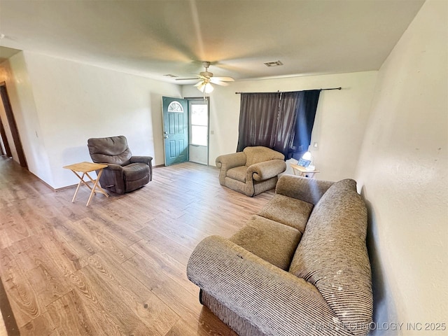 17564 W Grandview Dr, Tahlequah, OK 74464 - living room featuring light wood finished floors and a ceiling fan