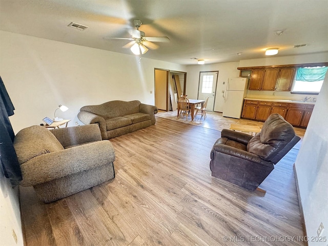 17564 W Grandview Dr, Tahlequah, OK 74464 - living room with light wood-style flooring and ceiling fan