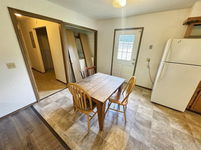 17564 W Grandview Dr, Tahlequah, OK 74464 - dining space featuring baseboards
