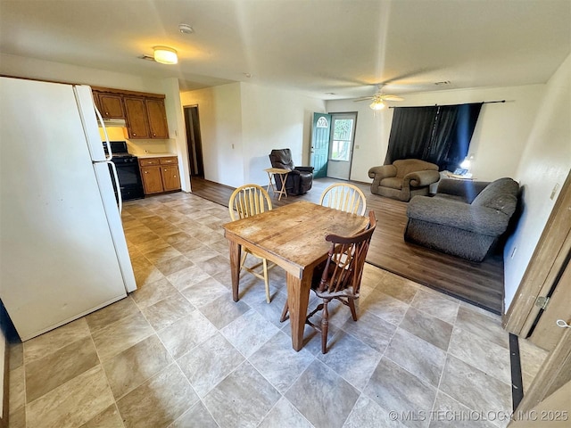 17564 W Grandview Dr, Tahlequah, OK 74464 - dining room with ceiling fan and stone finish flooring