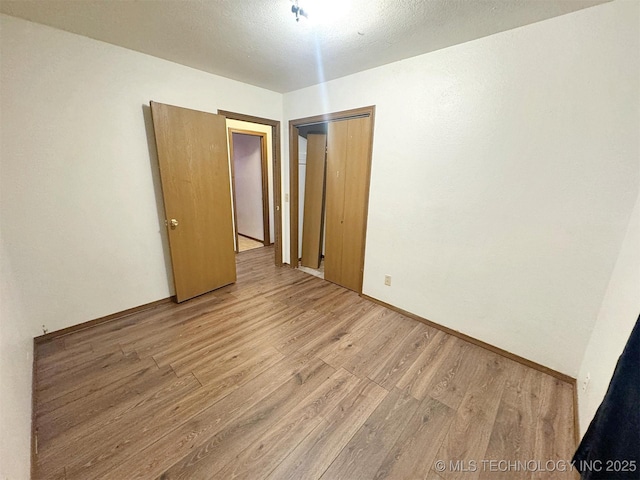 17564 W Grandview Dr, Tahlequah, OK 74464 - empty room featuring light wood finished floors and baseboards