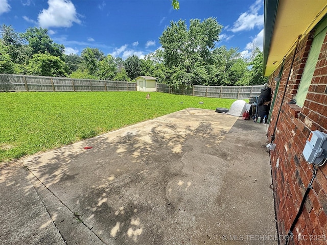 17564 W Grandview Dr, Tahlequah, OK 74464 - fenced backyard featuring a patio area, a shed, and view of scattered trees