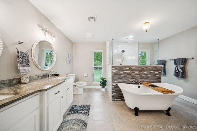 7705 S 232nd E Ave, Broken Arrow, OK 74014 - full bathroom with a tile shower, double vanity, a freestanding bath, and tile patterned floors