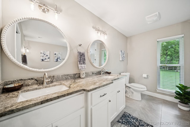 7705 S 232nd E Ave, Broken Arrow, OK 74014 - bathroom with double vanity and toilet