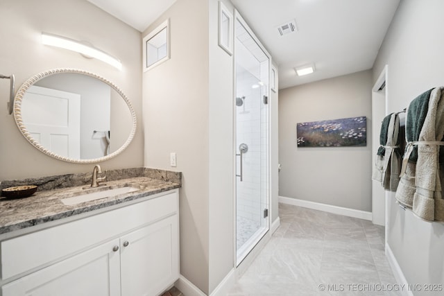 7705 S 232nd E Ave, Broken Arrow, OK 74014 - bathroom featuring a shower stall, vanity, and marble finish flooring