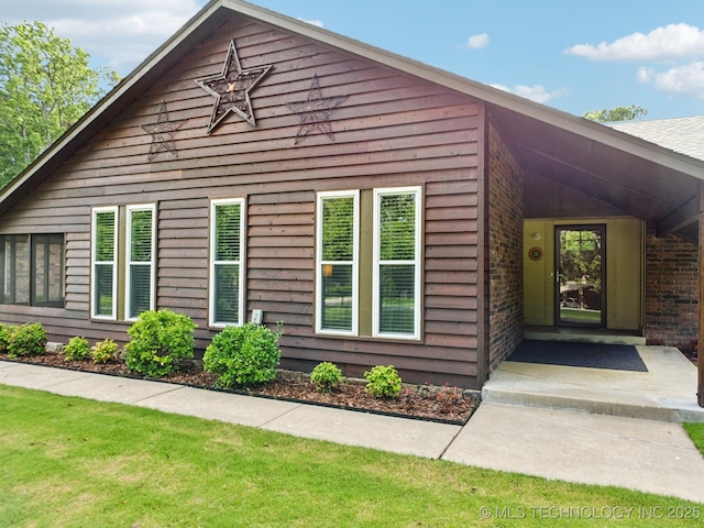 7705 S 232nd E Ave, Broken Arrow, OK 74014 - view of front facade with a front lawn