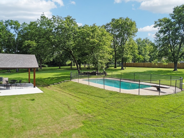 7705 S 232nd E Ave, Broken Arrow, OK 74014 - view of swimming pool featuring a patio area, view of wooded area, and a gazebo