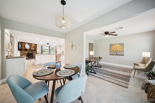 7705 S 232nd E Ave, Broken Arrow, OK 74014 - dining area featuring ceiling fan and baseboards