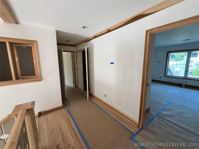 4954 S Boston Pl, Tulsa, OK 74105 - hall with baseboards and wood finished floors