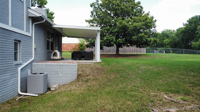 9802 E Clover Creek Dr, Claremore, OK 74017 - view of yard with a patio area