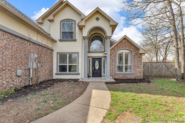 12916 E 181st St S, Bixby, OK 74008 - doorway to property with stucco siding