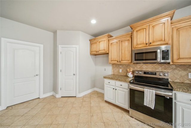 12916 E 181st St S, Bixby, OK 74008 - kitchen with appliances with stainless steel finishes, decorative backsplash, and recessed lighting