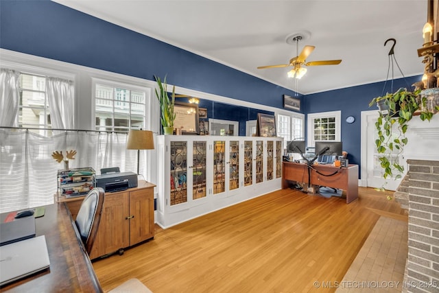 1006 E 17th Pl, Tulsa, OK 74120 - office area featuring light wood finished floors and ceiling fan