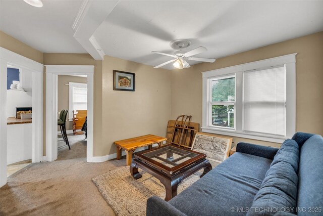 1006 E 17th Pl, Tulsa, OK 74120 - living room featuring light carpet and ceiling fan