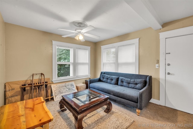 1006 E 17th Pl, Tulsa, OK 74120 - living area featuring carpet floors, a ceiling fan, and beamed ceiling