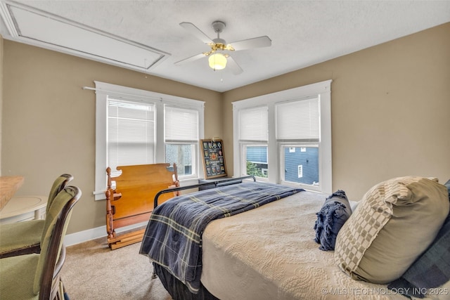 1006 E 17th Pl, Tulsa, OK 74120 - bedroom featuring attic access, carpet, and ceiling fan