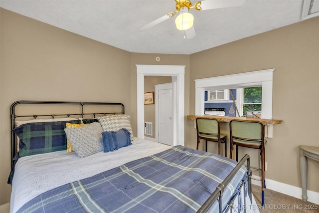 1006 E 17th Pl, Tulsa, OK 74120 - bedroom featuring carpet and a ceiling fan