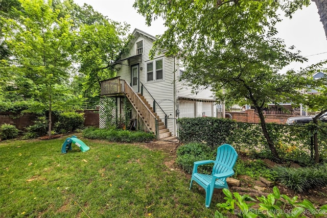 1006 E 17th Pl, Tulsa, OK 74120 - rear view of house featuring stairway and a garage