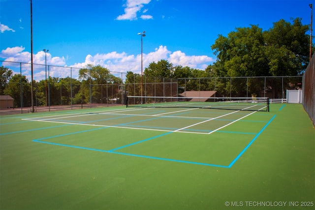 56701 E 310th Rd Unit 712, Afton, OK 74331 - view of tennis court featuring community basketball court