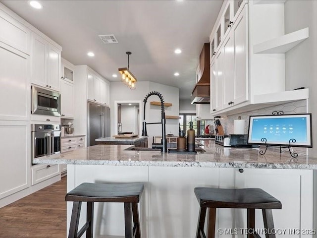 4270 S 4110th Rd, Talala, OK 74080 - kitchen with appliances with stainless steel finishes, open shelves, a peninsula, white cabinets, and recessed lighting