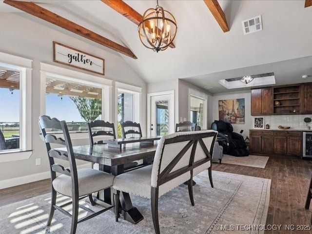 4270 S 4110th Rd, Talala, OK 74080 - dining room with dark wood-style flooring, wine cooler, and a chandelier