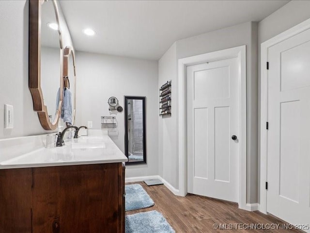 4270 S 4110th Rd, Talala, OK 74080 - bathroom with vanity and wood finished floors