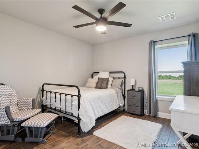 4270 S 4110th Rd, Talala, OK 74080 - bedroom with wood finished floors and a ceiling fan