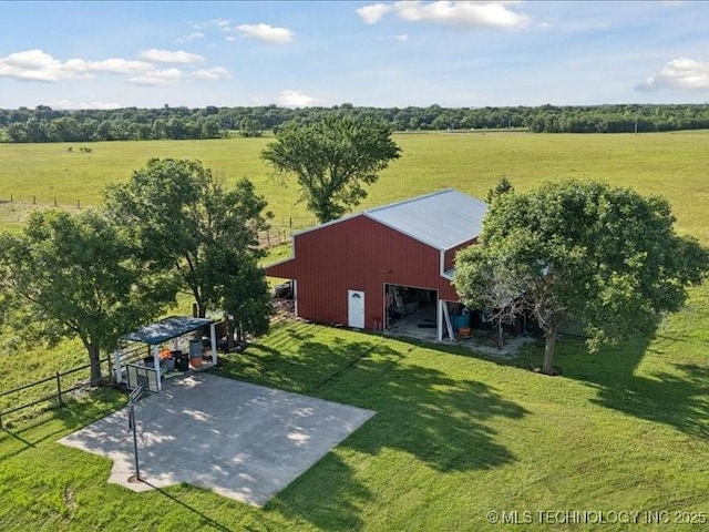 4270 S 4110th Rd, Talala, OK 74080 - view of yard featuring an outbuilding, an outdoor structure, a view of countryside, and a garage