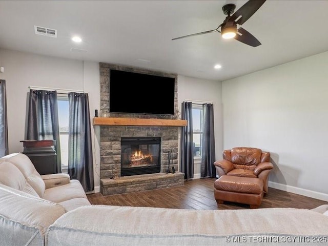 4270 S 4110th Rd, Talala, OK 74080 - living room featuring a stone fireplace, ceiling fan, wood finished floors, and recessed lighting