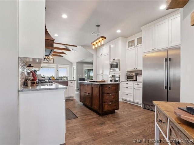 4270 S 4110th Rd, Talala, OK 74080 - kitchen featuring built in appliances, white cabinets, dark wood-type flooring, glass insert cabinets, and recessed lighting